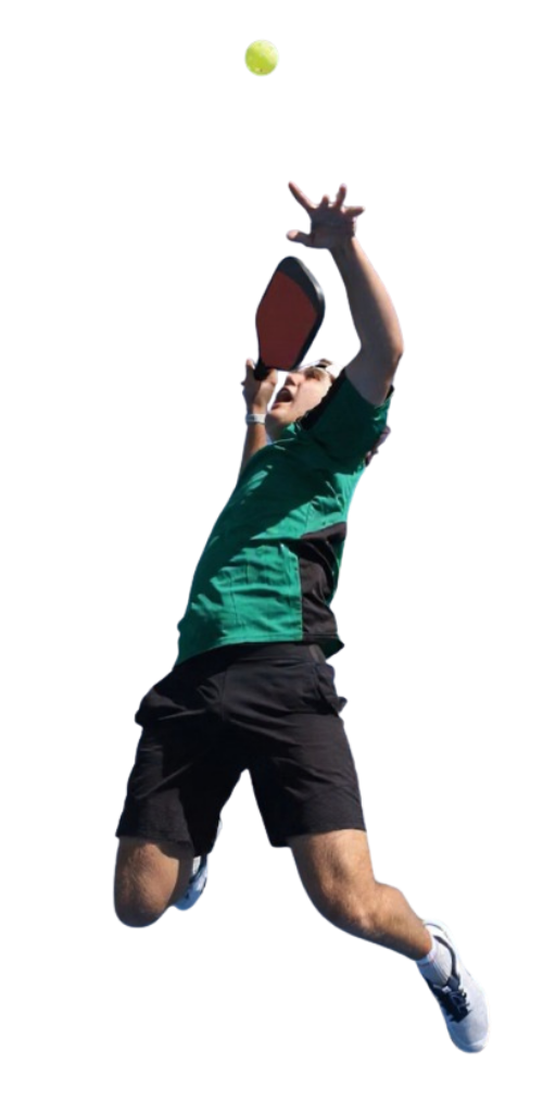 A male pickleball player jumping to spike the ball with a paddle.